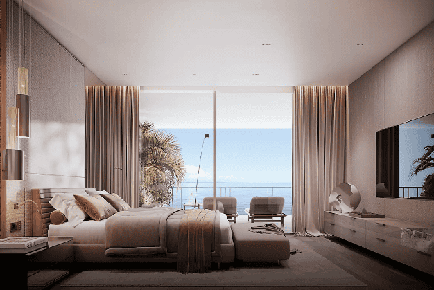 Elegant living room with sea view, modern decor, and large windows.